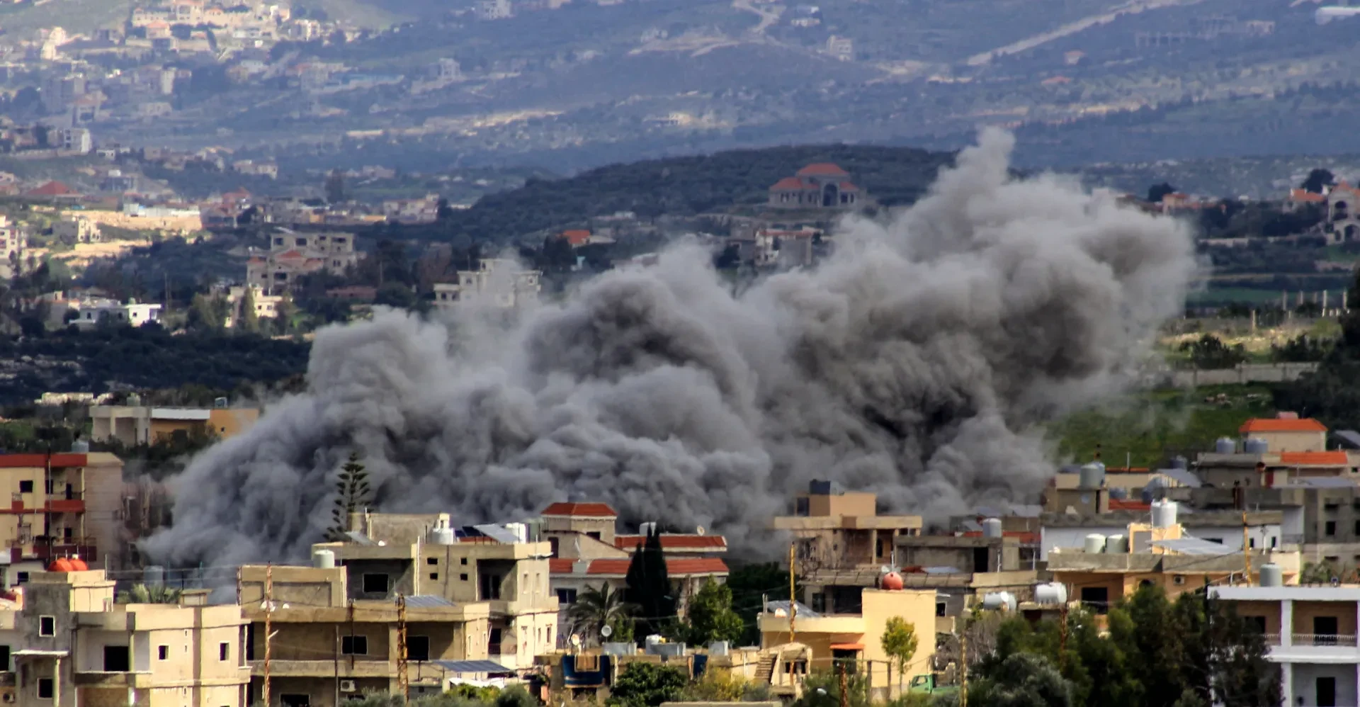 Israel and Hezbollah exchange strikes across Lebanon border