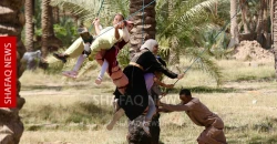 حبال بين النخيل.. أطفال قرية "بيرمانة" في بابل يحيون العيد بالبساطة والفرح (صور)