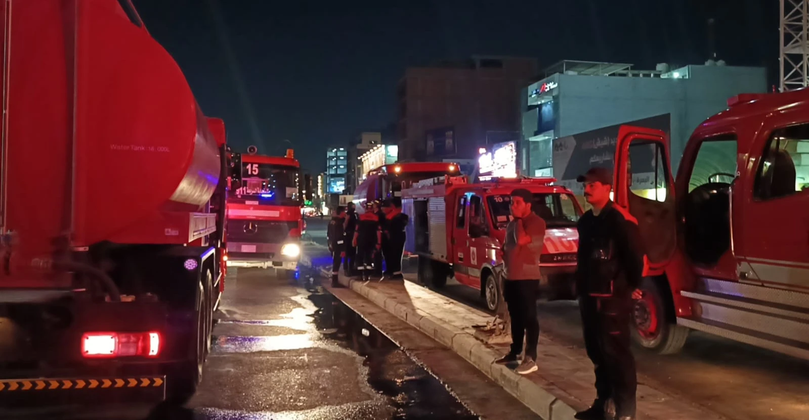 ‏هیزگردن ئاگر لەناو بینایگ بازرگانی لە مەنسور بەغدا