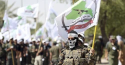 Asaib Ahl Al-Haq hands weapons to Iraqi state