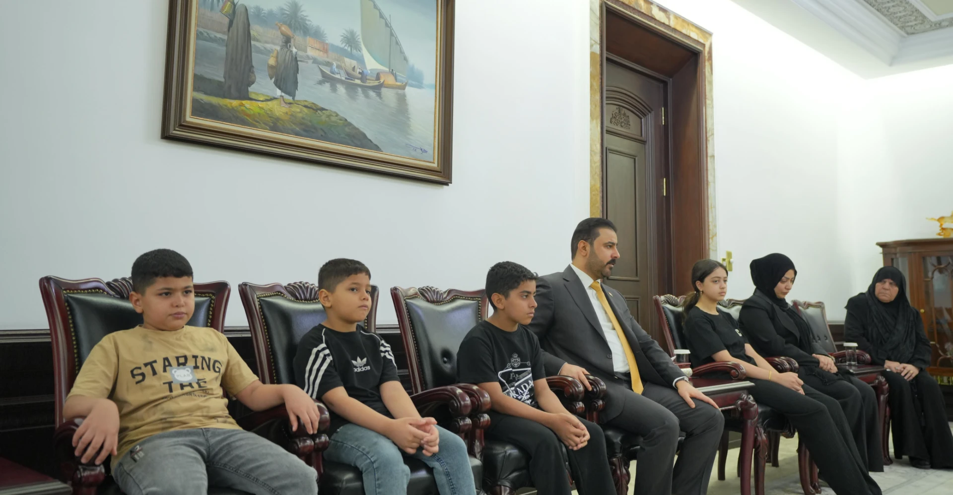 Iraq PM receives families of two police officers killed in Baghdad attack