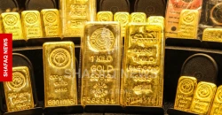 Gold slides on rising rate hike expectations