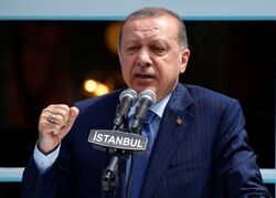After military shake-up, Erdogan says Turkey to tackle Kurds in Syria