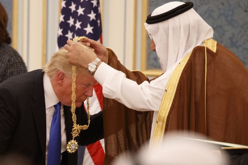 Trump basks in lavish Saudi welcome, escaping troubles in DC