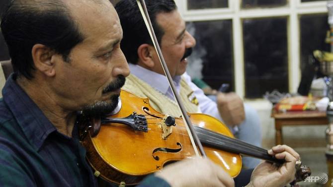 After years of silence, music fills streets of Iraq's Mosul