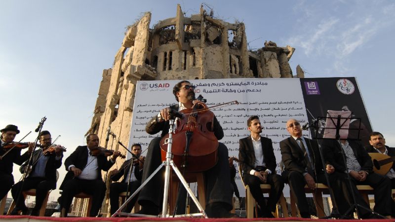 After years of silence, music fills streets of Iraq's Mosul