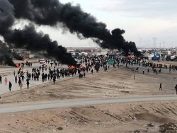 اصابة العشرات بدخانيات اثر تجدد المصادمات في احتجاج الناصرية