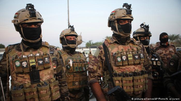 قوات من الجيش والشرطة تقطع شوارع أكبر مدن بغداد لفرض حظر التجول