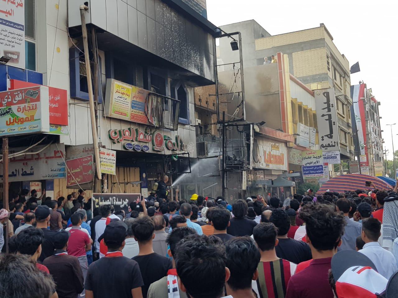 A fire break out in a restaurant near the protesters tents in al-Haboubi Square in Dhi Qar