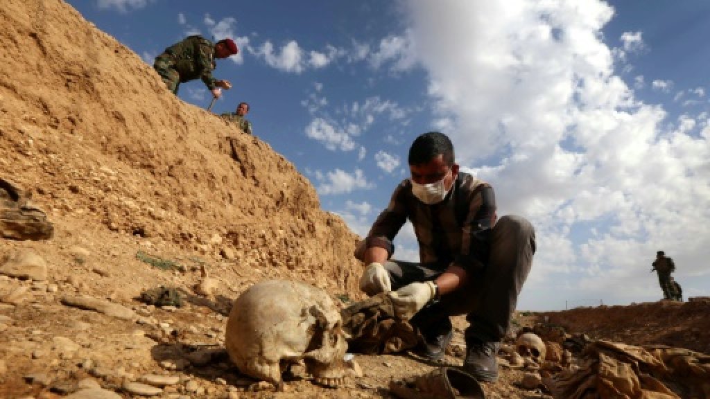 Iraq to identify remains from IS graves in Yazidi area