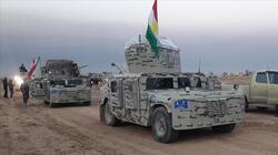 A clash between Peshmerga and an Iraqi force near Garmyan