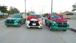 الشرطة العراقية تزف عروسين في زمن كورونا