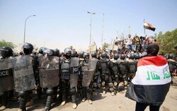 صدامات واعتقال متظاهرين في إحدى نواحي النجف