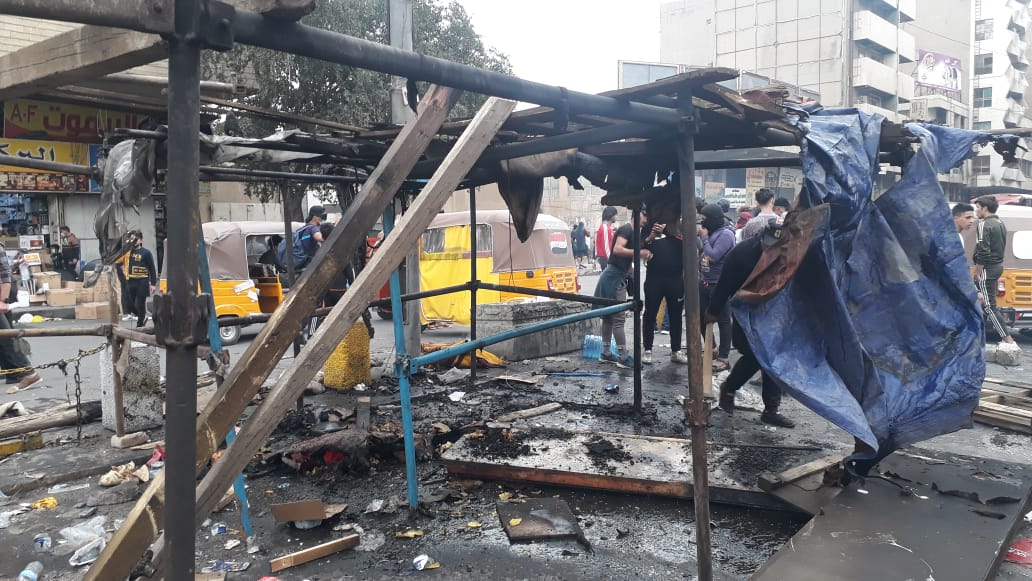 Images ..Riot police burn protestor’s tents at Tahrir square in Baghdad
