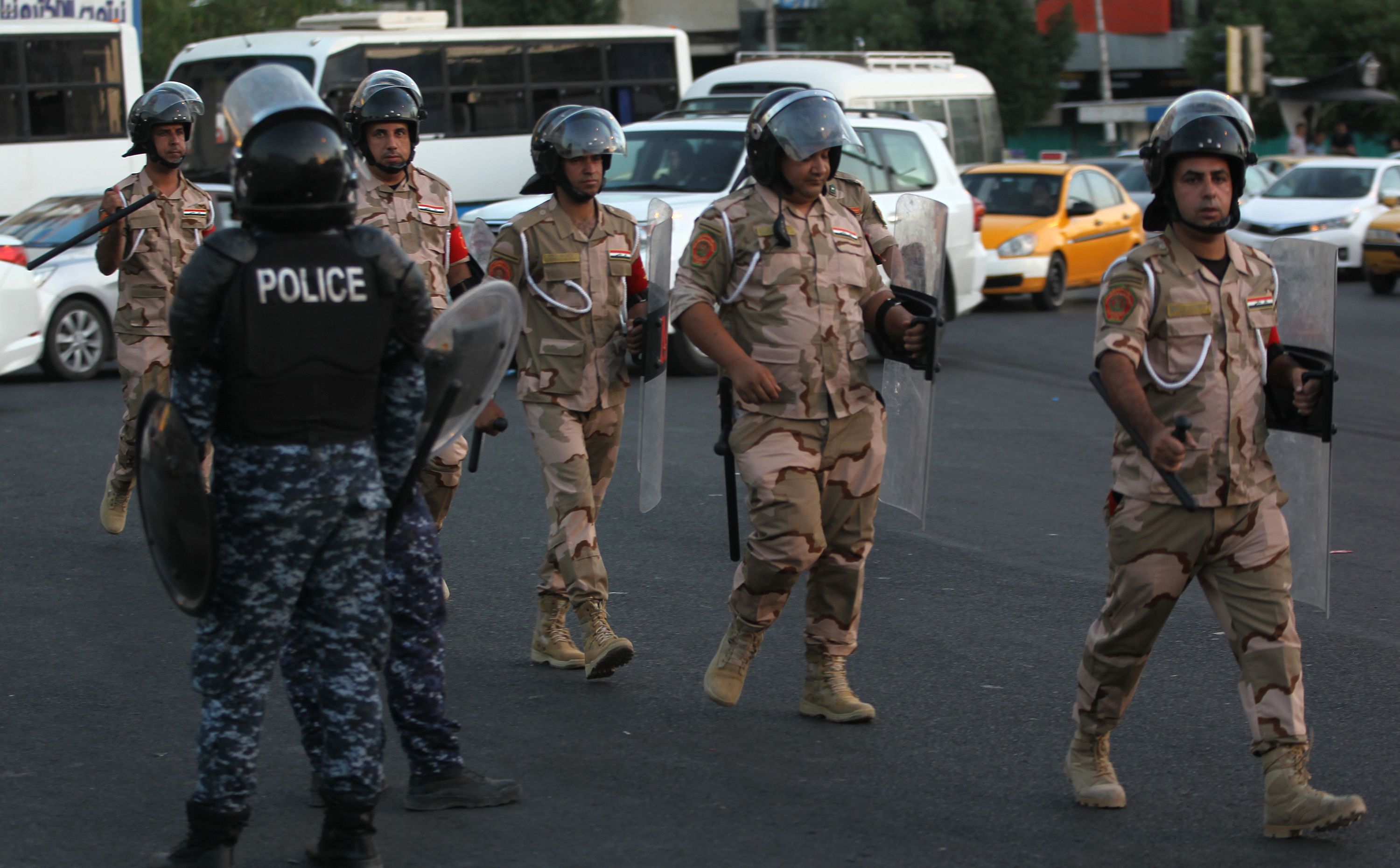A number of security personnel injured in an attack targeting them near the central bank in Baghdad
