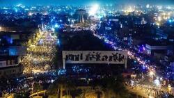 “Tahrir demonstrators” distance themselves from killing and hanging a person on a pillar