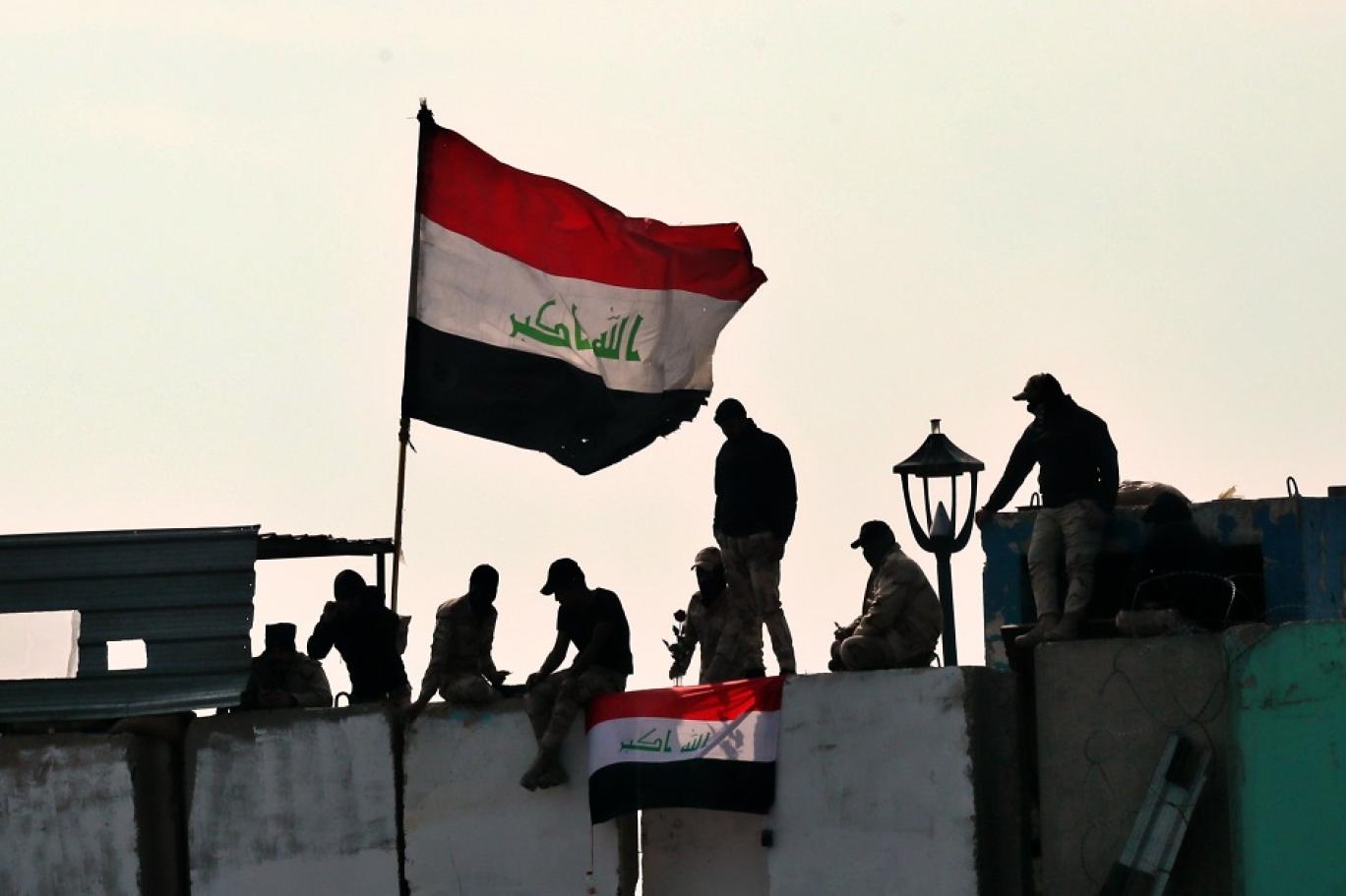 Iraq recalls "victory" over ISIS amid bloody protests