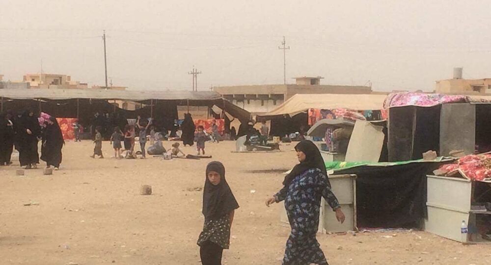 34 أسرة عراقية نازحة ترفض العودة إلى "مرمى النار"