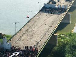 Asa'ib Ahl al-Haq distances itself from "extermination" threat of protesters in central Baghdad