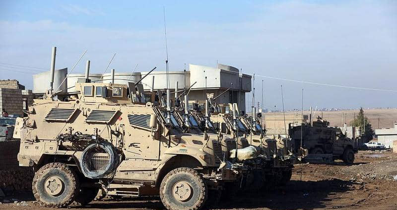 U.S. military trucks enter Iraq from northern Syria