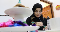 كركوك.. عزلة كورونا تساعد امرأة مبدعة على تطوير تجارتها (صور وفيديو)