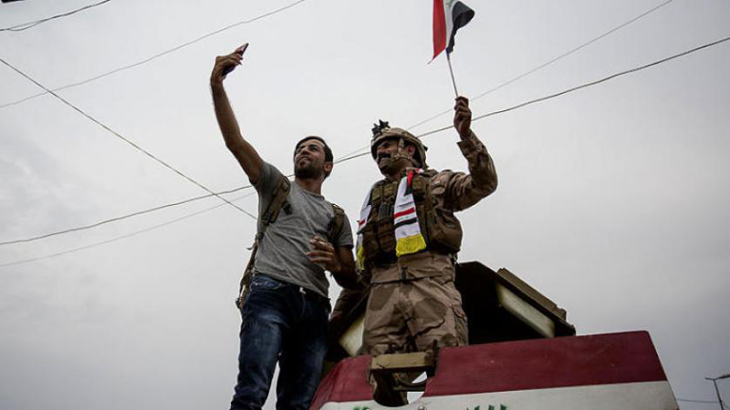 Streets closed in Baghdad, demonstrators allow security forces to approach them
