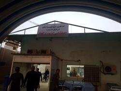 متظاهرون يستبدلون اسم مستشفى الحكيم بالنجف