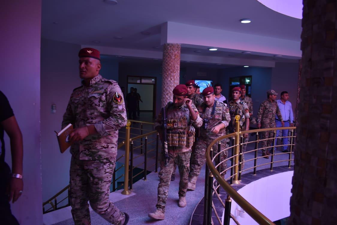 A heavily armed force storms the building of Fallujah administrative district